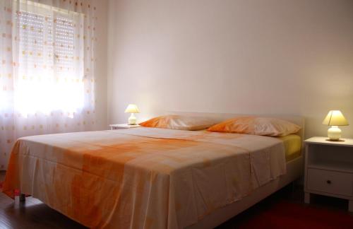 Posteľ alebo postele v izbe v ubytovaní Apartment Sendy