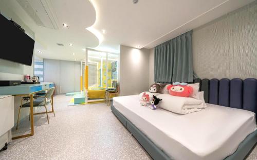 Jangyu Almond Kids Hotelにあるベッド