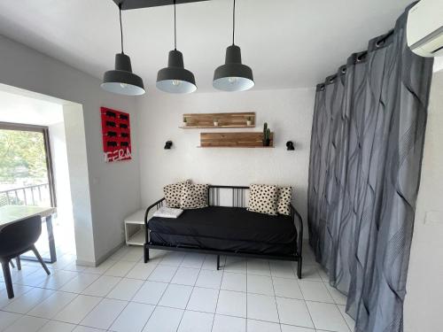 Ένα ή περισσότερα κρεβάτια σε δωμάτιο στο Appartement 211 Les Salicornes