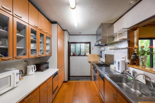 Una cocina o zona de cocina en 梅光園Baikoen