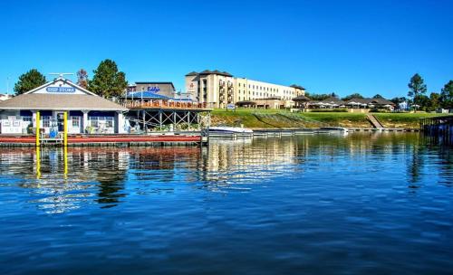 a large body of water with a building in the background at Shangri-La Resort in Monkey Island