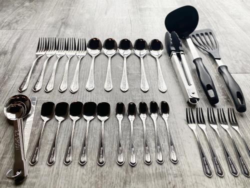 a group of utensils sitting on top of a table at casagrande in Koniya