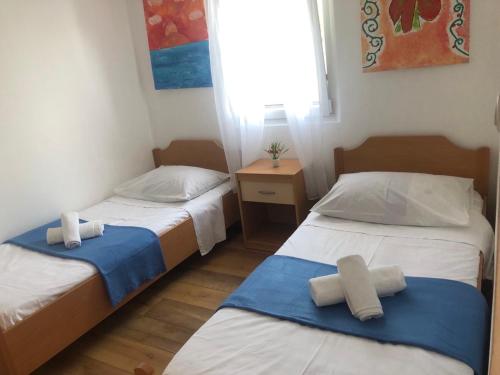 En eller flere senger på et rom på Holiday home Dumboka