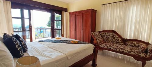Villa Lilly Sea View Private Poolにあるベッド