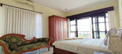 Villa Lilly Sea View Private Poolにあるベッド