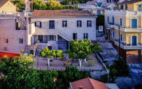 an aerial view of a city with buildings and trees at Aethra Boutique Rooms in Nafplio