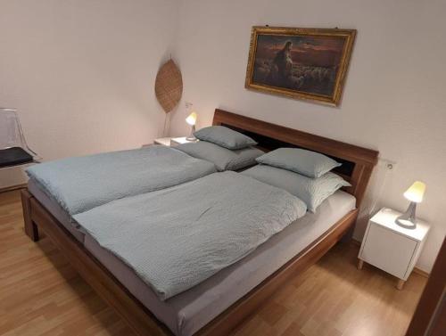 Кровать или кровати в номере Ferienwohnung in Göppingen