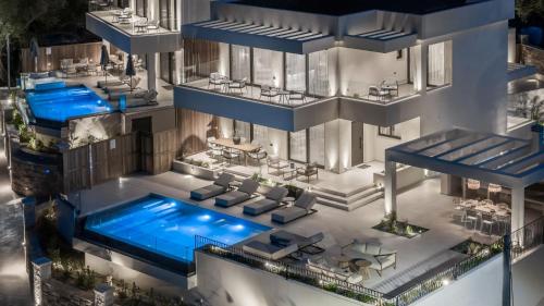 an aerial view of a building with a swimming pool at Eran Luxury Villa with Private Pool & Sea Views, by ZanteWize in Akrotiri
