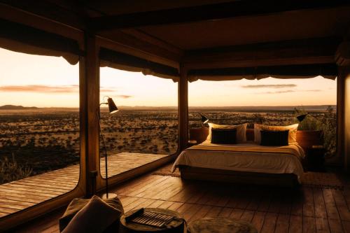 Katil atau katil-katil dalam bilik di Our Habitas Namibia