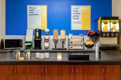 a counter with aasteryasteryasteryasteryasteryasteryasteryasteryasteryasteryasteryastery at Days Inn by Wyndham Medicine Hat in Medicine Hat