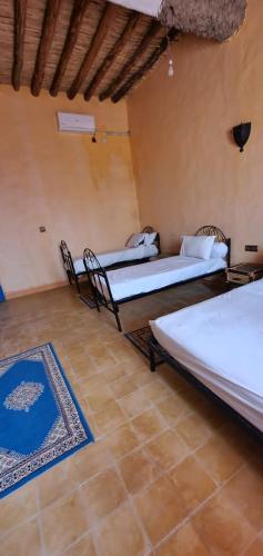 Katil atau katil-katil dalam bilik di Riad gnaoua khamlia