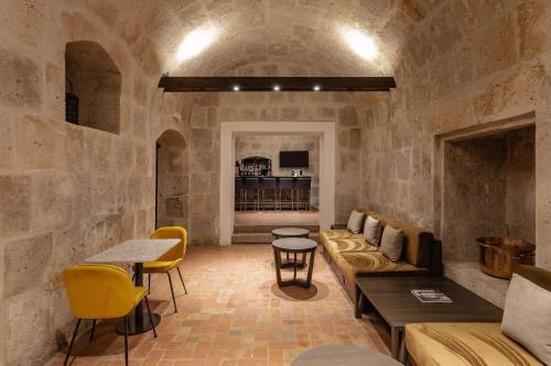 a living room with a couch and a table at Hampton by Hilton Arequipa in Arequipa