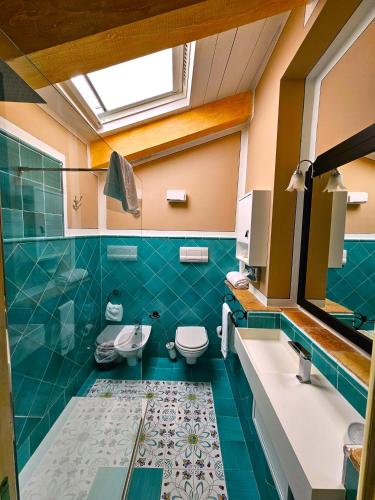 a bathroom with a toilet and a sink at Residenza Sveva in Termoli