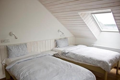 Postel nebo postele na pokoji v ubytování St. Prokop Luxury Apartments 254