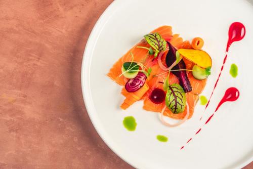 a white plate of food on a table at The Daffodil Hotel & Spa in Grasmere