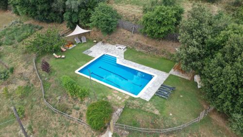 Bazén v ubytovaní El Porxo de Can Baixeres alebo v jeho blízkosti