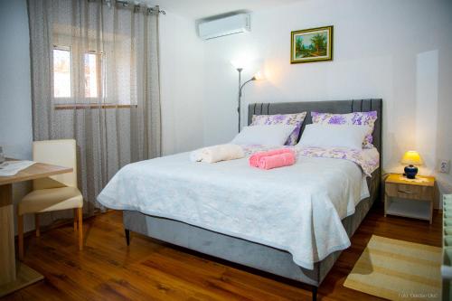 Postel nebo postele na pokoji v ubytování Apartments Faris