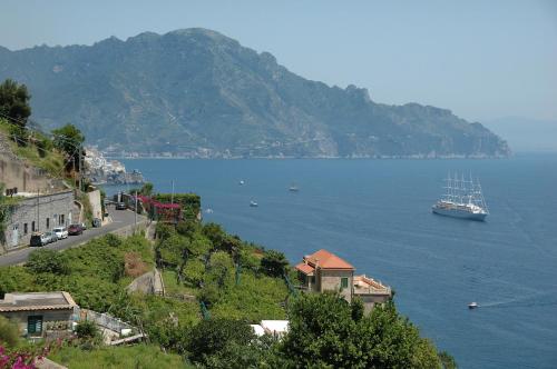 a large boat in a large body of water at Locanda Costa D'Amalfi in Amalfi
