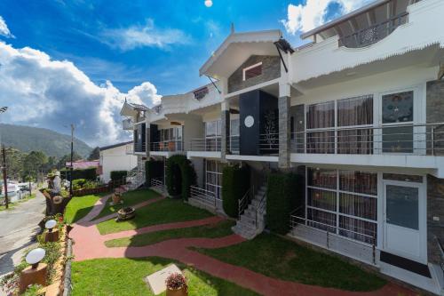 a view of the exterior of a building at Fortune Retreats in Ooty