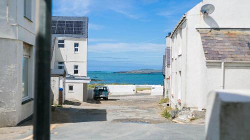 a view of the ocean from a building at Brig y Don in Rhosneigr