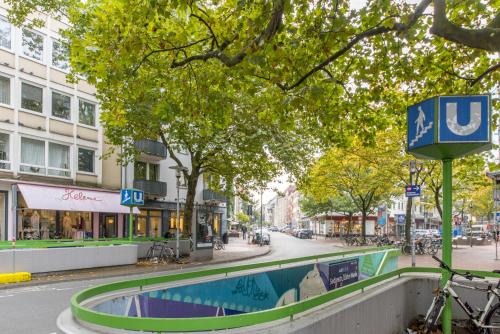 a street with a pool in the middle of a city at Private Rooms in Hannover