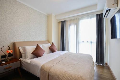 Postel nebo postele na pokoji v ubytování Newly Luxury Resort Style Condo