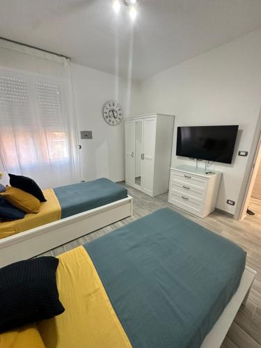 Ένα ή περισσότερα κρεβάτια σε δωμάτιο στο Gemma suites whole apartment