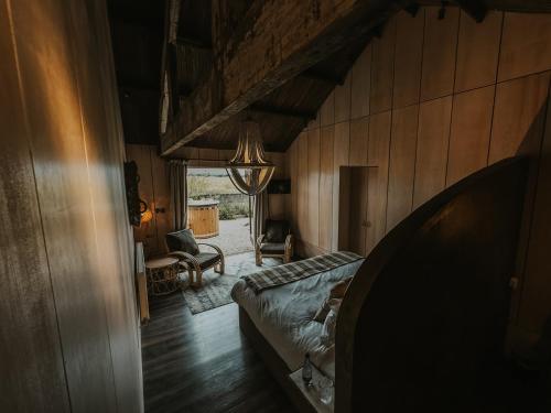 Postel nebo postele na pokoji v ubytování Runa Farm