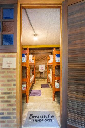 Auá Hostelにあるベッド