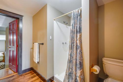 a bathroom with a shower and a toilet at Buskirk Vacation Rental with Deck and Putting Green! in Buskirk