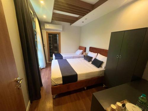 a bedroom with two beds in a room at Beta Hotel Avcılar in Avcılar