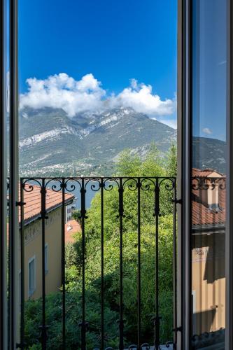 a view of a mountain from a window at Villa Lilla Bellagio - Luxury Pool and Wine with Lake view in Bellagio