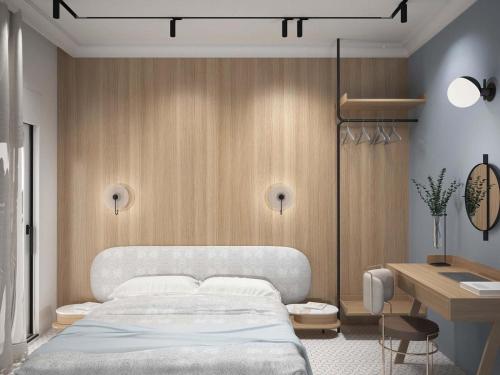 a bedroom with a bed and a desk at XANTHI POLIS CITY CENTER with private parking in Xanthi