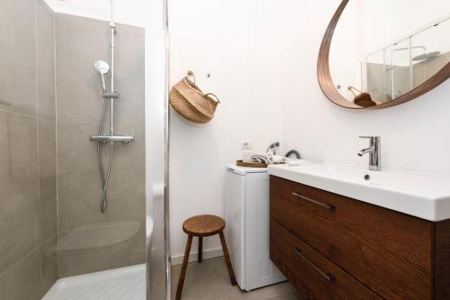 a bathroom with a shower and a sink and a mirror at BELVEDERE - Garda Leisure in Salò