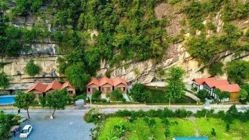 an aerial view of a house with a mountain at Trang An Memory Homestay in Ninh Binh