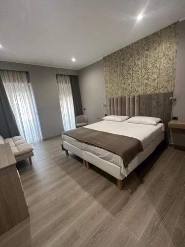 Postel nebo postele na pokoji v ubytování B&b Sanem Luxury rooms