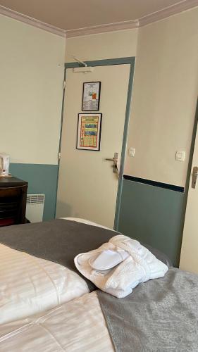 Кровать или кровати в номере Amadeus Hotel