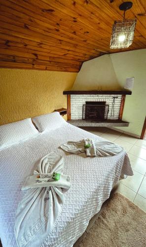 Katil atau katil-katil dalam bilik di Hotel Pião Mineiro