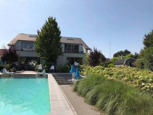 Gallery image of Vakantievilla met zwembad, wellness en glamping in Paal/Beringen in Beringen