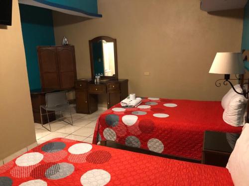 Ένα ή περισσότερα κρεβάτια σε δωμάτιο στο HOTEL PARAÍSO DEL VALLE