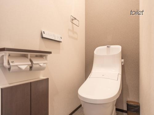 a bathroom with a white toilet in a room at WeeklyHouse Biwako Otsu - Vacation STAY 19732v in Otsu
