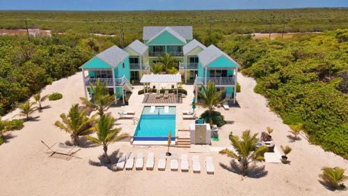 an aerial view of a house on the beach at The Turtle Nest at Cottages in Sand Bluff