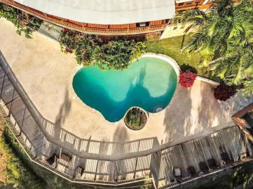 an overhead view of a swimming pool at 3 bed 2 bath W pool @ Juncos in Canovanas