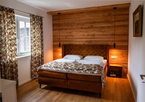 Postel nebo postele na pokoji v ubytování Vierseitenhof Appartements