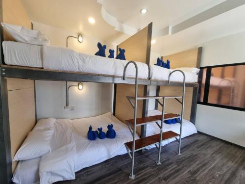 Postel nebo postele na pokoji v ubytování 7 Days Premium Hotel Pattaya