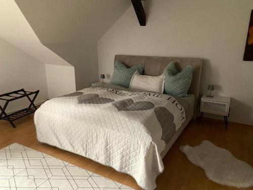 a bedroom with a large bed in a room at Stilvolle Ferienwohnung in historischer Stadtvilla in Neubrandenburg