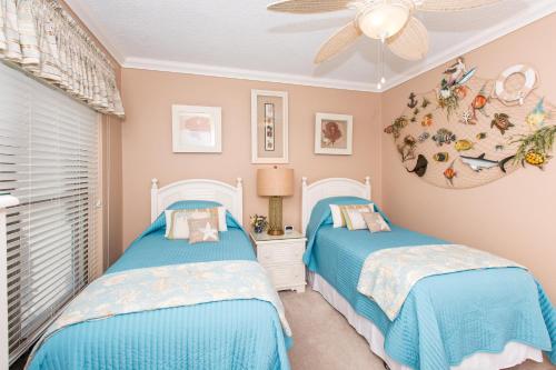 Posteľ alebo postele v izbe v ubytovaní Georgetown Villas #203