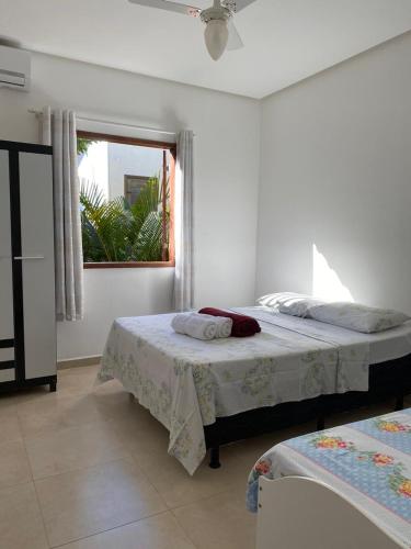 Ένα ή περισσότερα κρεβάτια σε δωμάτιο στο Apartamento 102 no Vivendas do Serrano em Lençóis