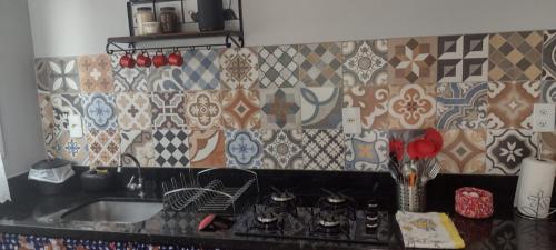 A kitchen or kitchenette at Pousada Casa no Sitio