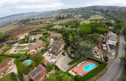 an aerial view of a house with a swimming pool at La Dolce Sosta in Campagnano di Roma